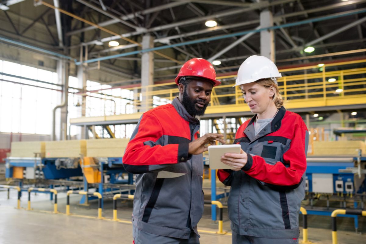Manufacturing frontline workers using Microsoft Teams on factory floor